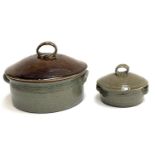 Two studio pottery stoneware lidded casserole pots, bear mark 'T.', 31.5cmD and 17cmD (2)