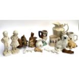 A mixed lot of ceramics to include Staffordshire frog mug, Staffordshire dog, owl jug, rabbit pot