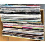 A mixed box of vinyl LPs to include Boney M, Simon and Garfunkel, Eurythmics, Beach Boys, The Hits