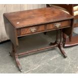 A 20th century occasional table in the form of a sofa table, 64cmW