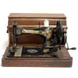 A Singer sewing machine, serial number 12780815