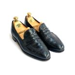 A pair of New & Lingwood black leather loafers, size 8E, with Crockett & Jones wooden shoe trees