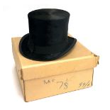 A black silk top hat, 20.5x16cm, in cardboard box