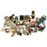A quantity of toys, figures and dolls to include Sylvanian families, Polly Pocket etc