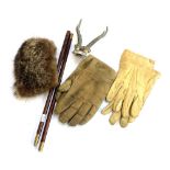 A gun cleaning rod; roe deer antlers; a fur cuff, two pairs of suede gloves