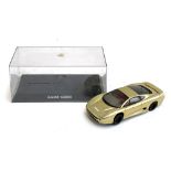 A Scalextric Jaguar XJ220 in gold, boxed