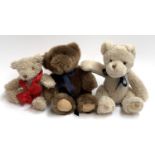 Two Harrods teddy bears, together with one other, the tallest 24cmH