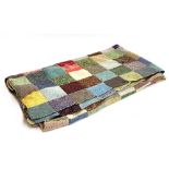 A large handmade knitted patchwork throw, approx. 200x200cm