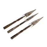 Three African, likely South Sudanese spear heads with barbed tips, the longest approx. 31cmL