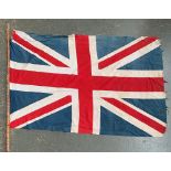 A 19th century union jack cotton flag, on tiger bamboo pole, approx. 175x115cm, the pole 247cm long