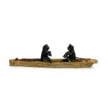 A cold painted casting of two cats rowing, 12cm long