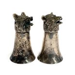Two plated stirrup cups, of flared plain beaker form, with realistically cast snarling fox and