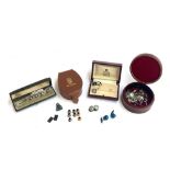 Several leather and other stud boxes containing a quantity of gents studs and cufflinks, to