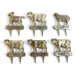 A set of six silver plated cheese markers, modelled with cows, goat and sheep if relief