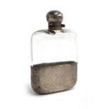 A late Victorian silver hip flask by James Dixon and Sons, Sheffield, monogrammed H. M. G. 20th