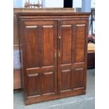 An 18th century oak cupboard, with fielded panel doors, 137x50x169cm