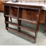 A set of Victorian mahogany kitchen shelves, with moulded pediment top, above three shelves,