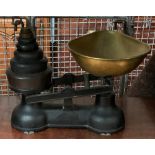 A set of Salter kitchen scales, with weights and brass hopper