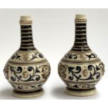 A pair of Italian glazed stoneware vases with scrolling design, 24.5cmH