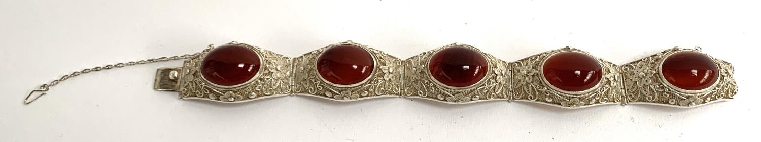 An early 20th century Chinese export silver filigree bracelet set with carnelian cabochons, with - Image 2 of 4