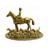 A cast brass figure group of a huntsman and hounds, 18.5cm high
