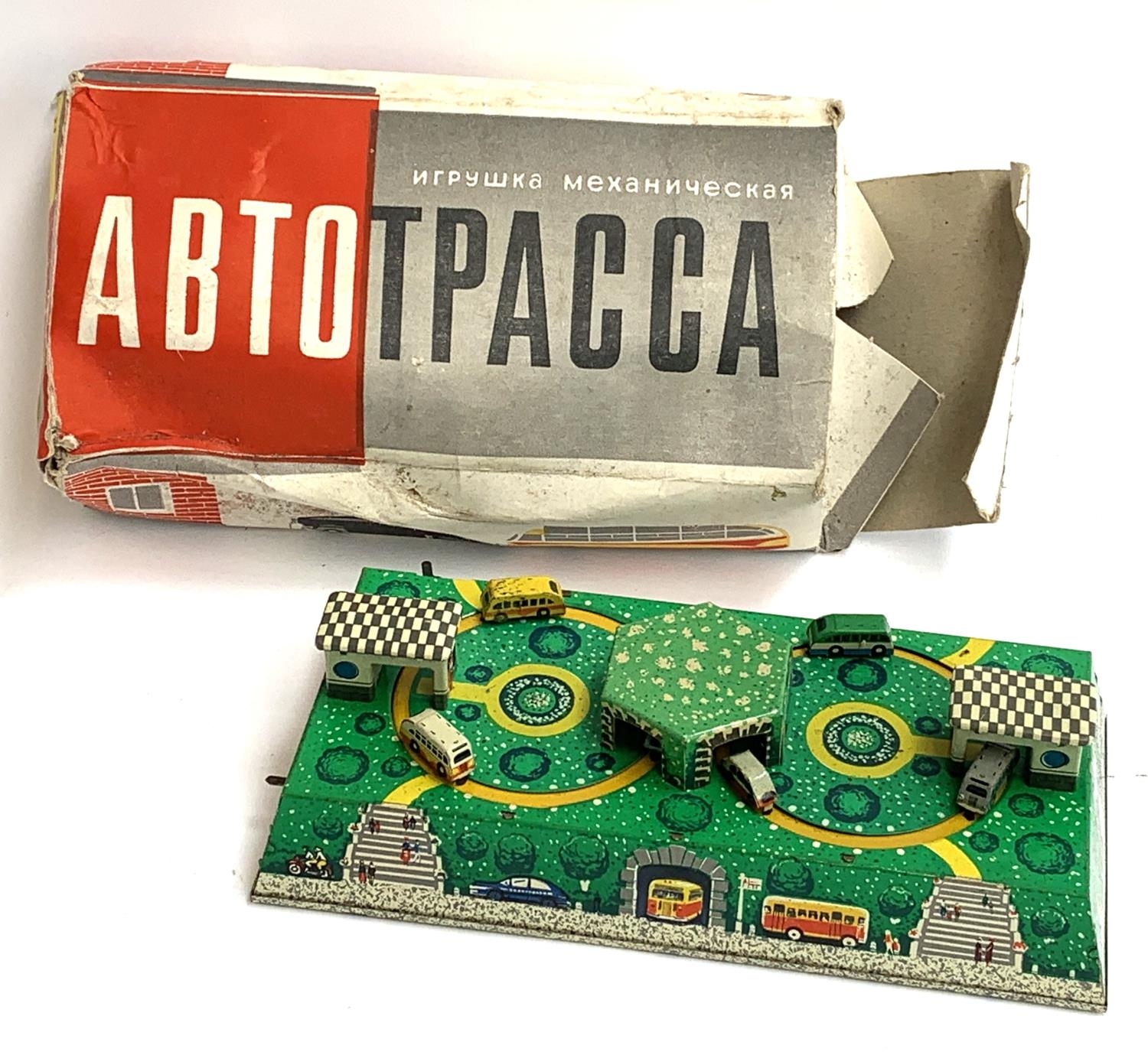 An Abtotpacca tin wind up bus terminal station, with box