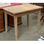 A 19th century small pine kitchen table, with side drawer, on square tapered legs, 100x69x79cmH