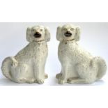 A pair of Staffordshire dogs, highlighted in gilt, 32cmH