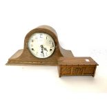 An oak cased mantel clock, the dial marked 'Belfast'; together with a small music box in the form of