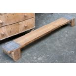 An early 20th century low pine bench, 187x20cmH