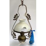 A brass hanging oil lamp with chimney and milk glass shade (the shade AF)