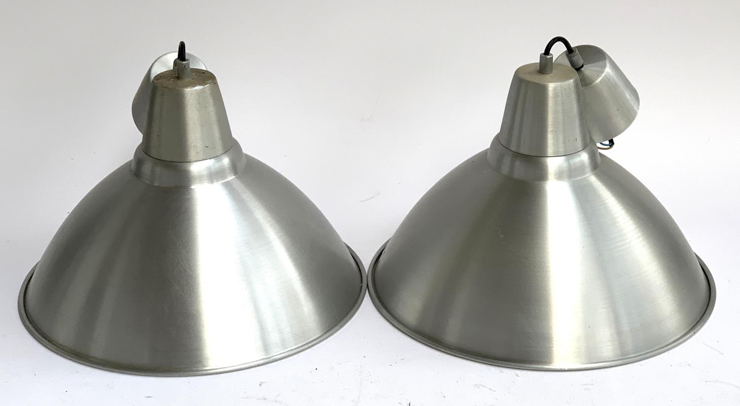 A pair of spun aluminium industrial style light shades, approx. 39cmD