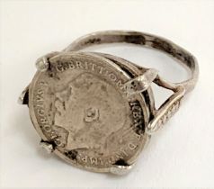A silver ring set with a 1911 George V maundy threepence, size L