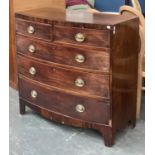 A 19th century mahogany bowfront chest of two short over three graduating drawers, on bracket