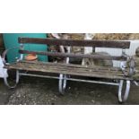 An iron garden bench with slatted wooden seat, approx 175cmW