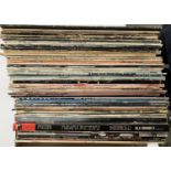 A mixed lot of vinyl LPs to include AC/DC, Bob Dylan, Spandau Ballet, Bessie Smith, Queen, Status