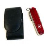 A Victorinox Swiss army knife with leather case