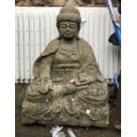 A composite stone figure of a seated Buddha, 65cmH