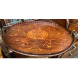 A mahogany and marquetry oval tray, with checkered gallery and twin brass handles, 69cmW