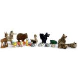 A mixed lot of animal figurines, to include lapis cat, malachite frog, carved wooden elephant, etc
