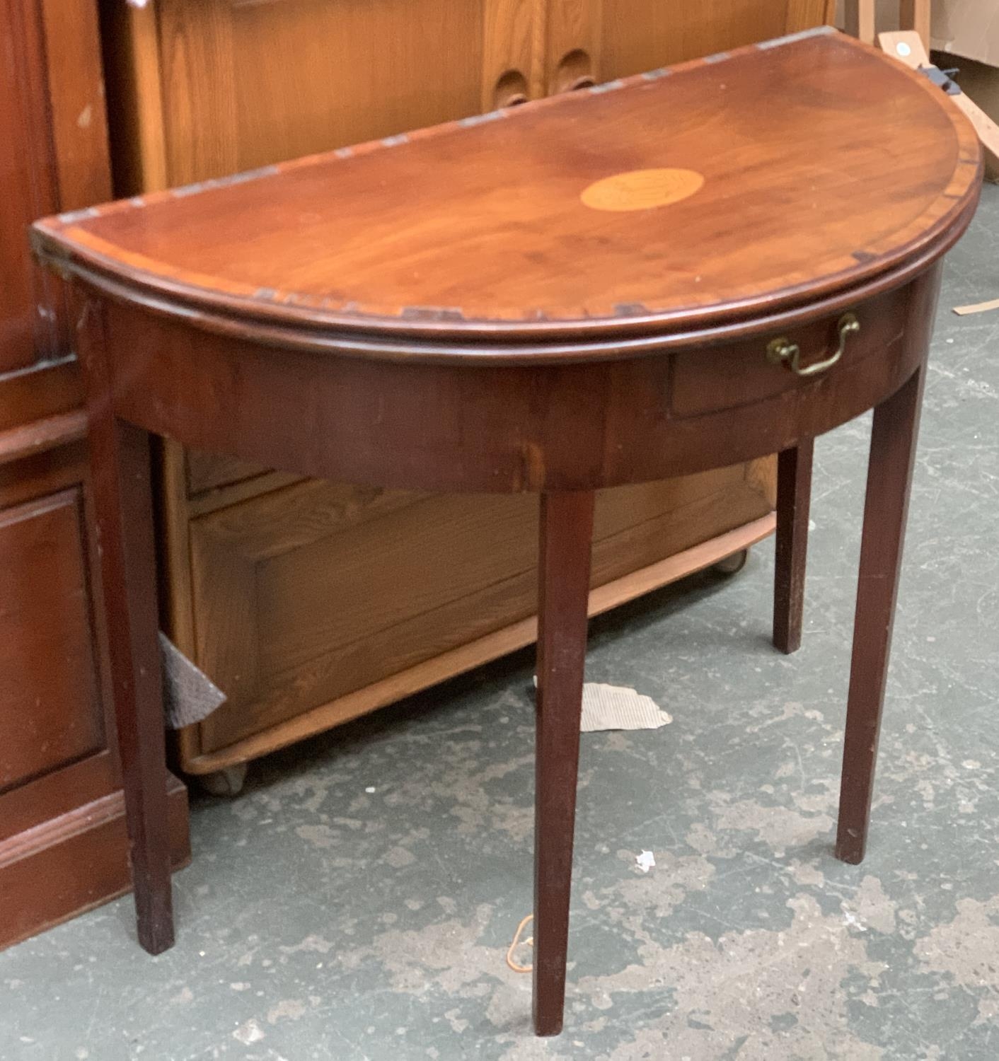 A 19th century demilune card table, fold over baize top, single frieze drawer on plain square