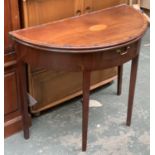 A 19th century demilune card table, fold over baize top, single frieze drawer on plain square