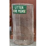 An industrial galvanised metal bin, with enamel plaque reading 'Litter Here Please', 53cmH