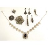 A quantity of white metal items, mainly filigree, to include necklace set with a blue cabochon,