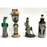 A Chinese ceramic multi coloured bird figurine, 29.5cmH ; together with a Chinese glazed lamp in the
