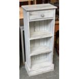 A painted and distressed narrow bookcase, with single drawer, 43x25x107cmH