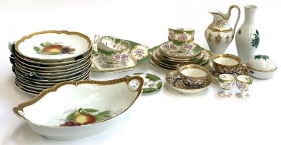 A pair of 19th century Royal Crown Derby teacups and saucers (af), with puce crown marks; together