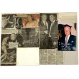 An autographed photo of Sir Henry Cooper with dedication, together with newspaper clippings