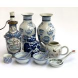 A quantity of ceramics to include Chinese rice ware bowls and spoons; vases with cup decoration,