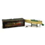 A Hornby clockwork speed boat, no. 1, with metal stand and original key boxed, (box af)